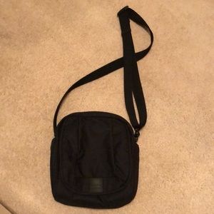 Black Pacsafe Crossbody Purse